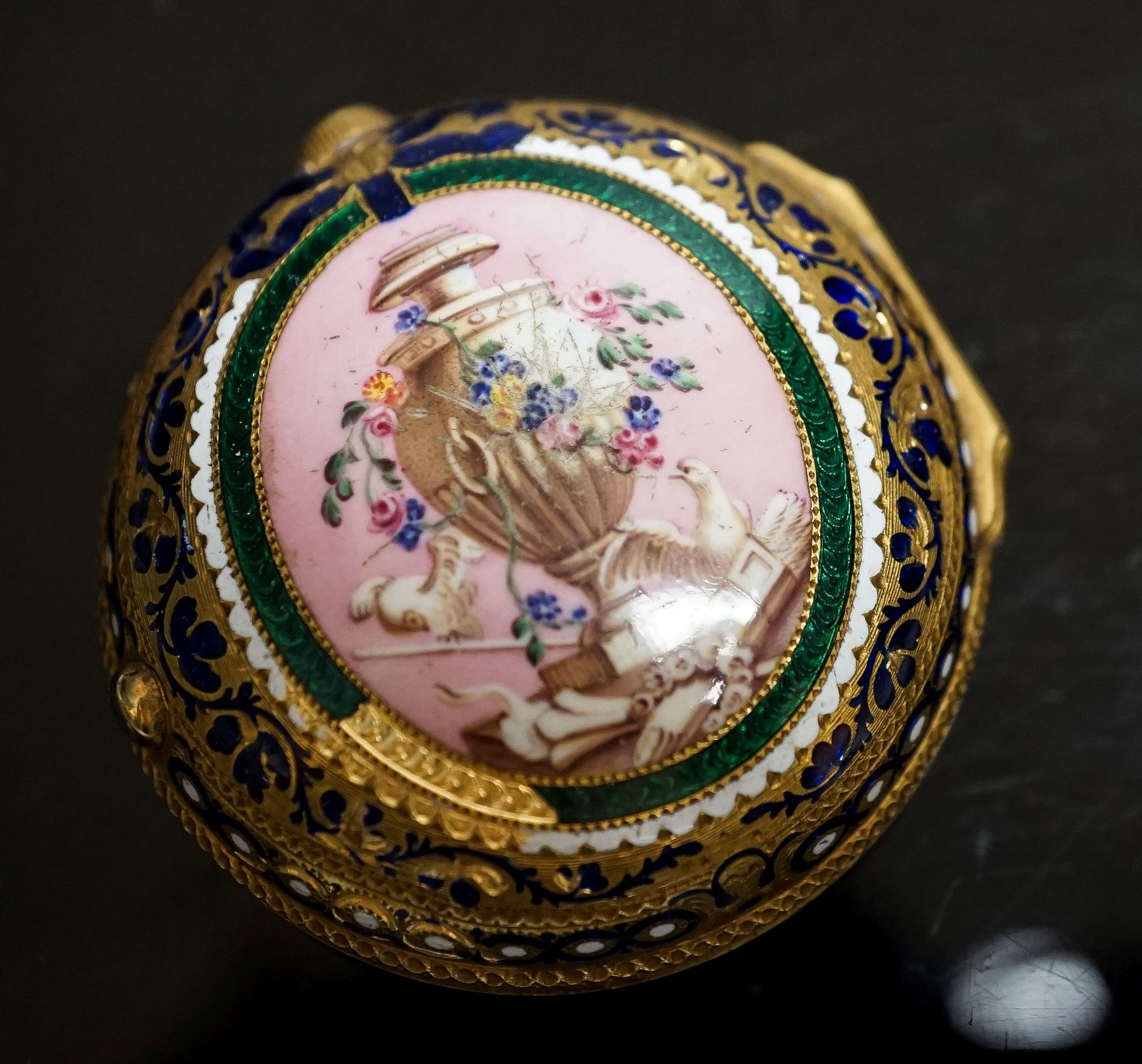 A 19th century yellow metal and enamelled pocket watch watch case (enamel a.f.), 48mm, gross weight 31.6 grams.